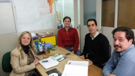 Mesa de reunião com representantes da Fepagro e da Uergs